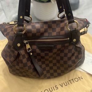 Product Line: Louis Vuitton Evora MM
Pattern: Monogram